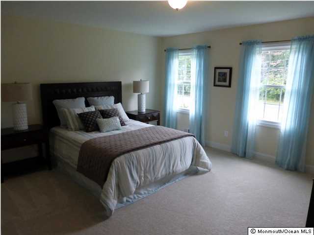 346 Diamond Road Jackson, NJ 08527 - Photo 13 of 23 a bedroom with a bed and window