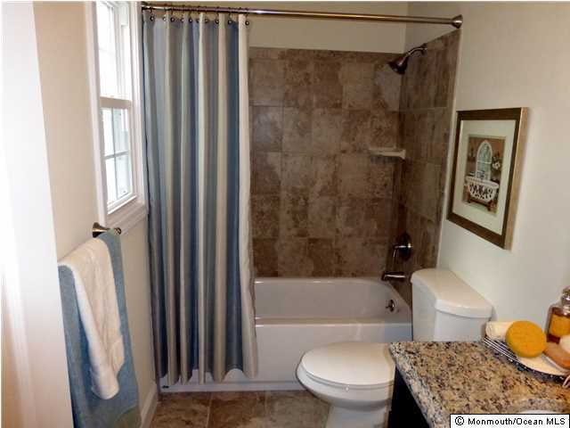 346 Diamond Road Jackson, NJ 08527 - Photo 17 of 23 a bathroom with a sink toilet and shower