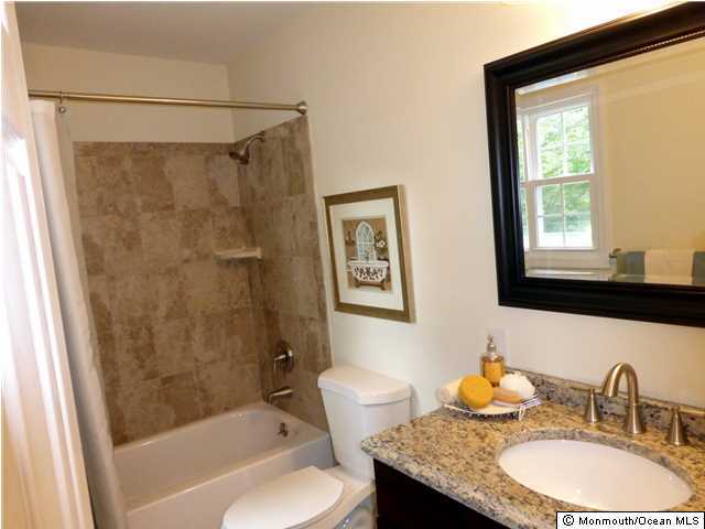 346 Diamond Road Jackson, NJ 08527 - Photo 18 of 23 a bathroom with a granite countertop sink toilet and shower