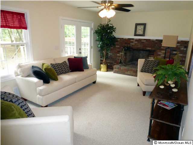 346 Diamond Road Jackson, NJ 08527 - Photo 5 of 23 a living room with furniture and a fireplace
