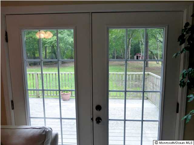 346 Diamond Road Jackson, NJ 08527 - Photo 7 of 23 a view of a glass door with a yard from a window