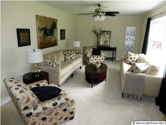 346 Diamond Road Jackson, NJ 08527 - Photo 8 of 23 a living room with furniture and a flat screen tv