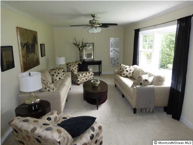 346 Diamond Road Jackson, NJ 08527 - Photo 9 of 23 a living room with furniture and a large window