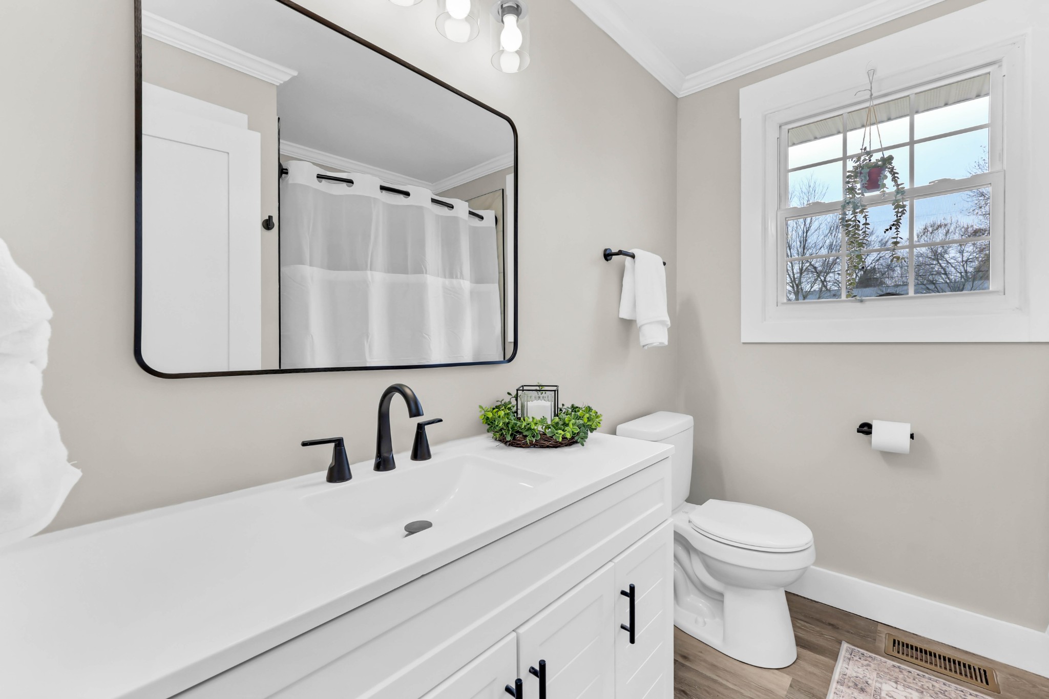 219 Jordan Road Clarksville, TN 37042 - Photo 16 of 22 a bathroom with a sink mirror and toilet