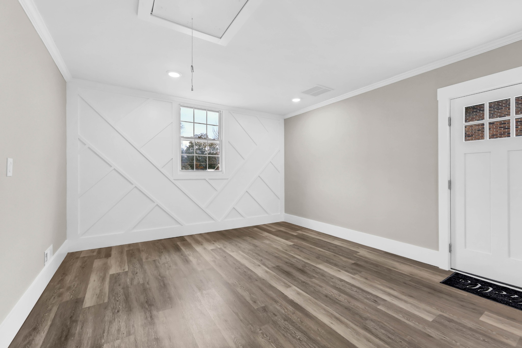 219 Jordan Road Clarksville, TN 37042 - Photo 18 of 22 an empty room with wooden floor and windows