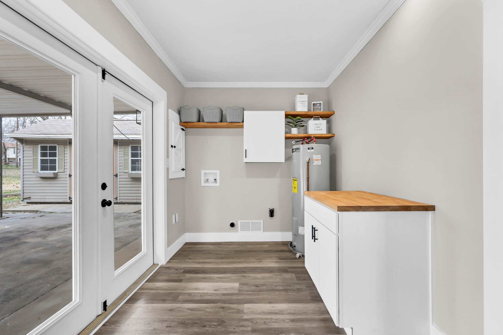 219 Jordan Road Clarksville, TN 37042 - Photo 20 of 22 a view of a hallway with wooden shelves