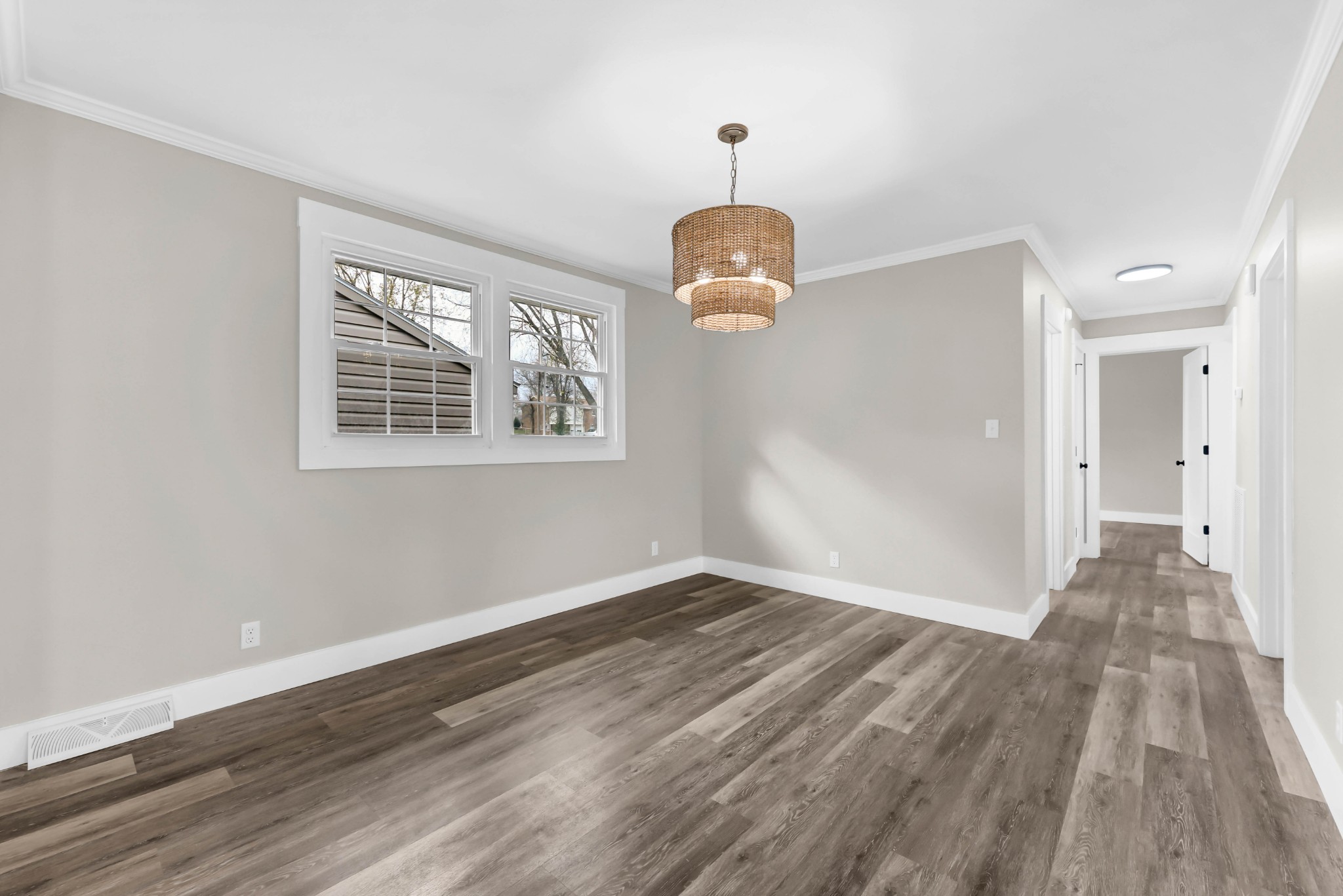 219 Jordan Road Clarksville, TN 37042 - Photo 6 of 22 wooden floor in an empty room with a window