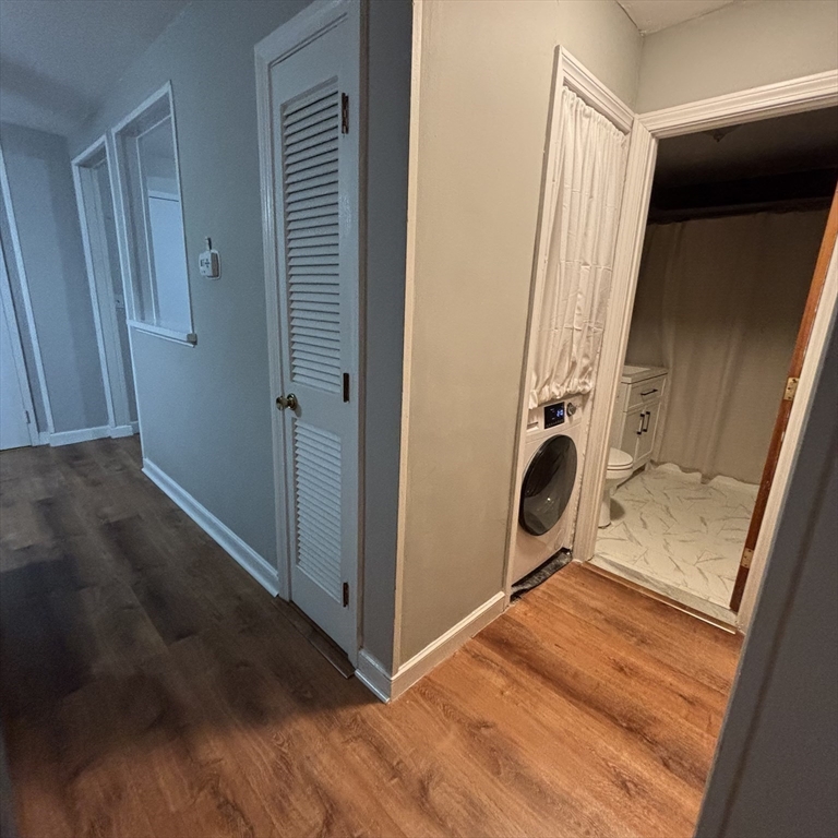 701 Adams Street, Unit 9 Boston, MA 02122 - Photo 14 of 19 a view of a storage and utility room with a sink