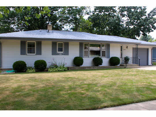4807 Mohawk Road Rockford, IL 61107 - Photo 1 of 11 a view of a house with a backyard