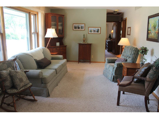 4807 Mohawk Road Rockford, IL 61107 - Photo 2 of 11 a living room with furniture and a window