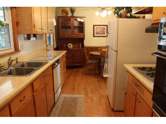 4807 Mohawk Road Rockford, IL 61107 - Photo 4 of 11 a kitchen with a sink and cabinets