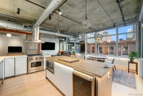 a kitchen with a stove and a microwave