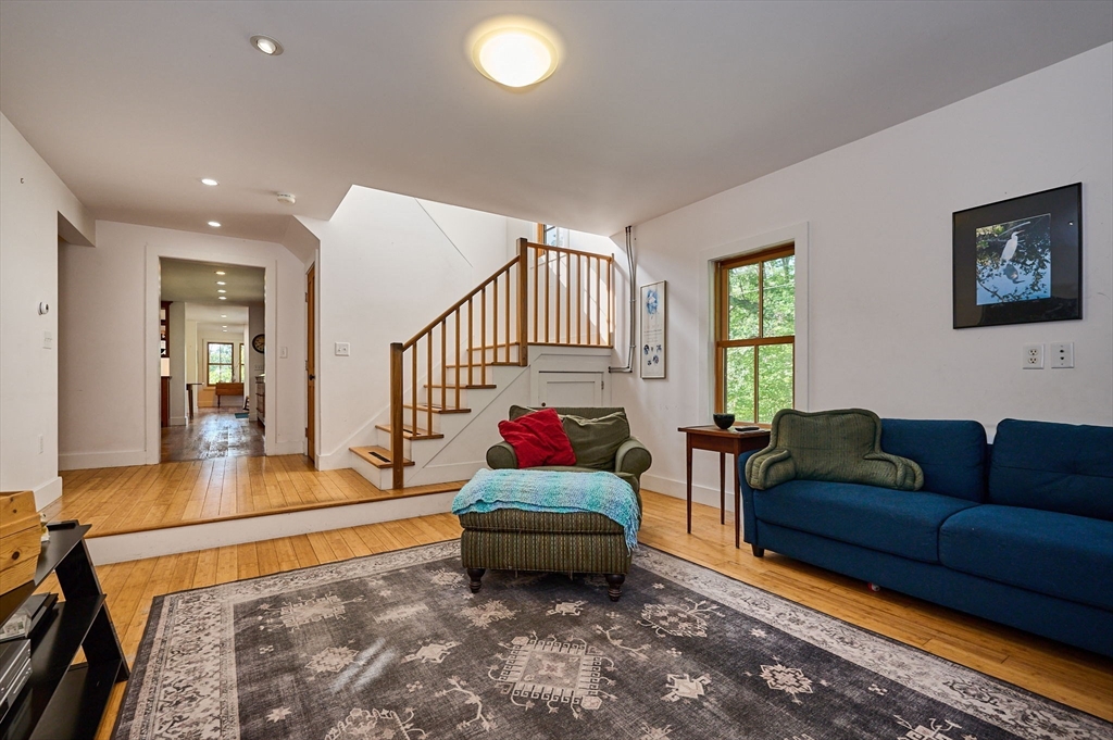 81 Smith Road Ashfield, MA 01330 - Photo 15 of 41 a living room with furniture and a couch