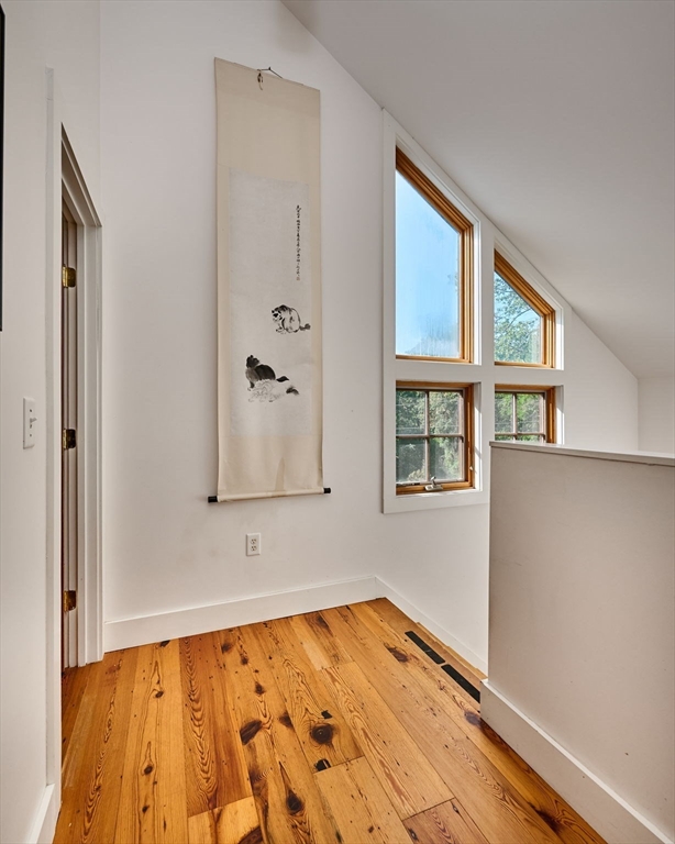 81 Smith Road Ashfield, MA 01330 - Photo 20 of 41 a view of an entryway with wooden floor and cabinet
