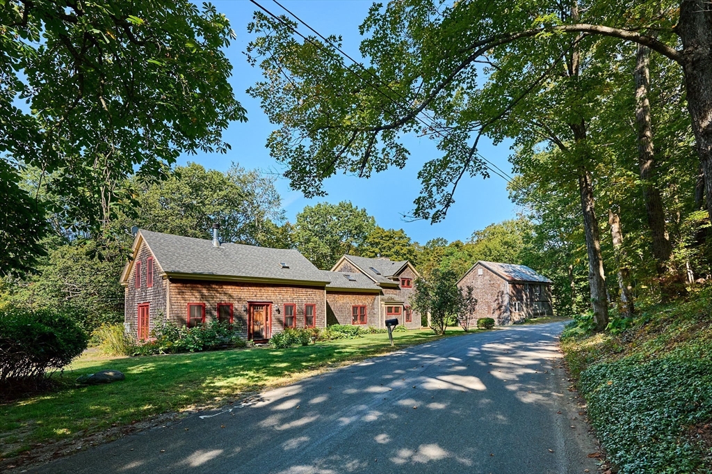 81 Smith Road Ashfield, MA 01330 - Photo 2 of 41 a view of a big house with a tree and a yard