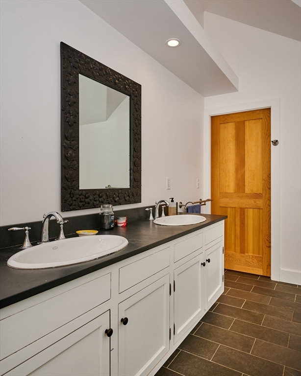 81 Smith Road Ashfield, MA 01330 - Photo 23 of 41 a bathroom with a double vanity sink and a mirror