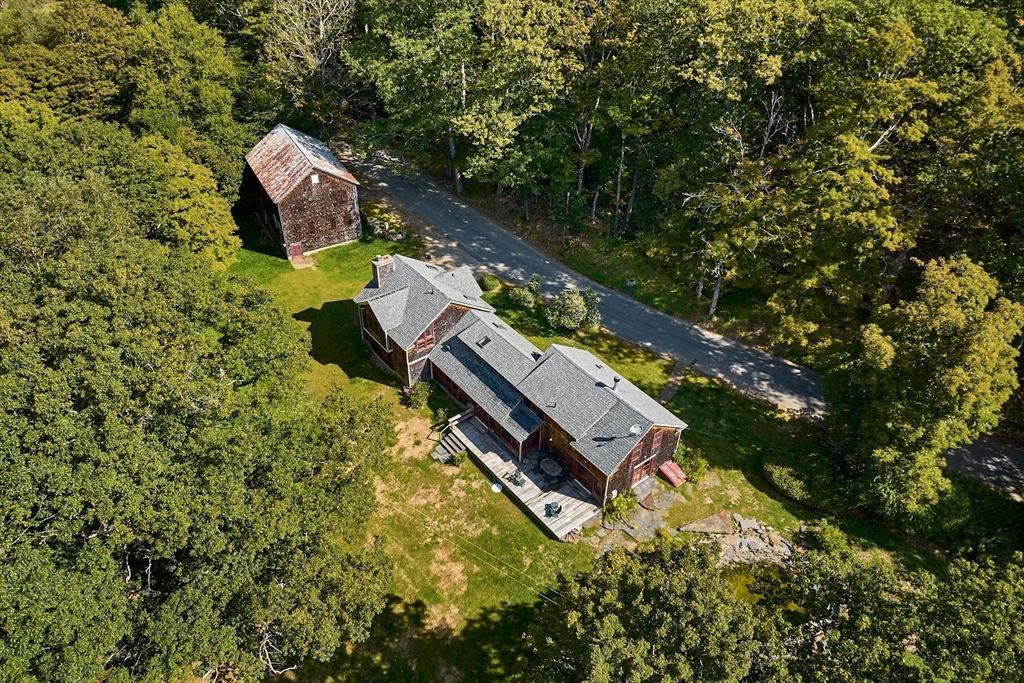 81 Smith Road Ashfield, MA 01330 - Photo 3 of 41 an aerial view of a house with a garden and trees