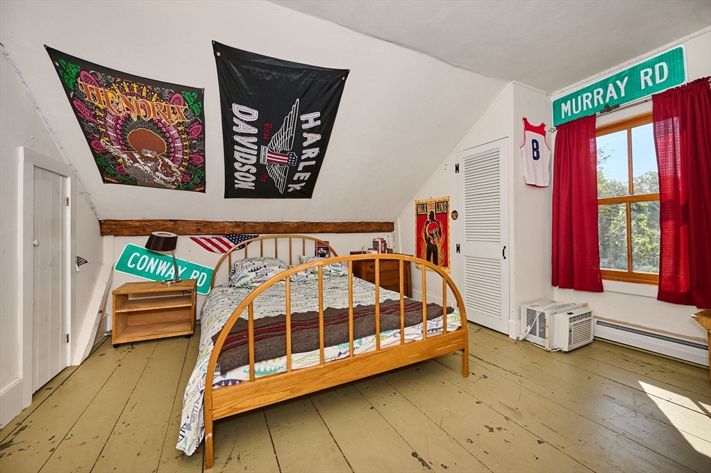 81 Smith Road Ashfield, MA 01330 - Photo 33 of 41 a view of a bedroom with furniture and window