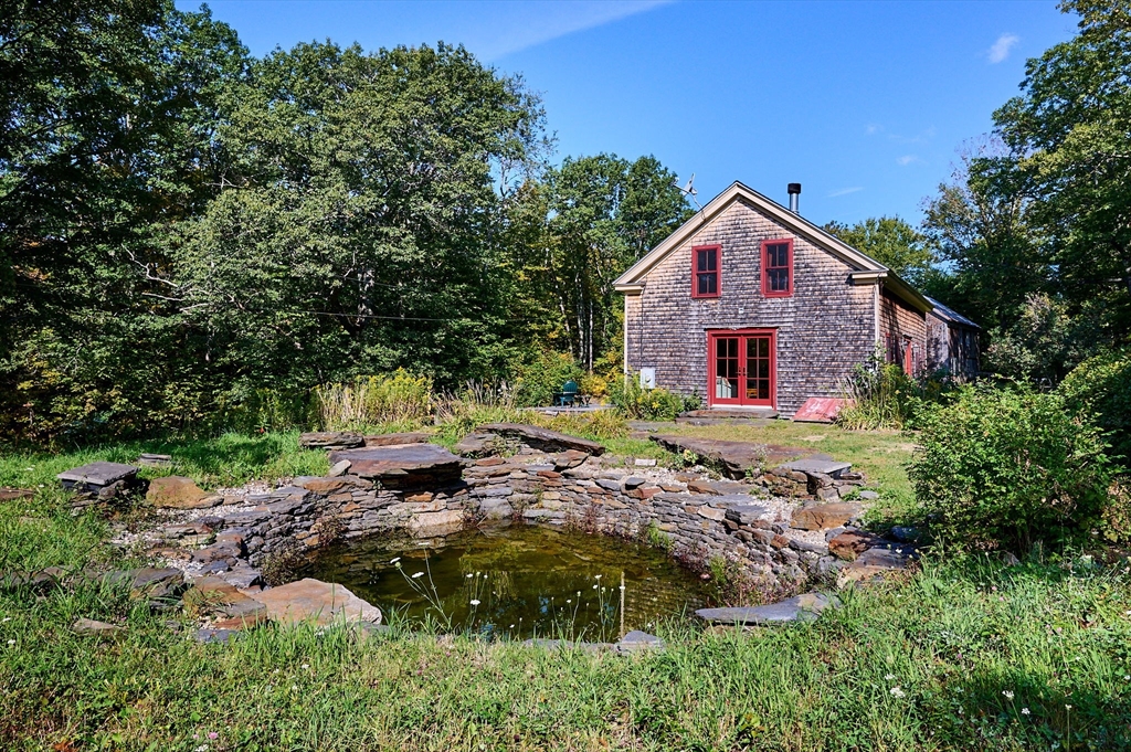 81 Smith Road Ashfield, MA 01330 - Photo 36 of 41 a view of a house with a yard and tree s
