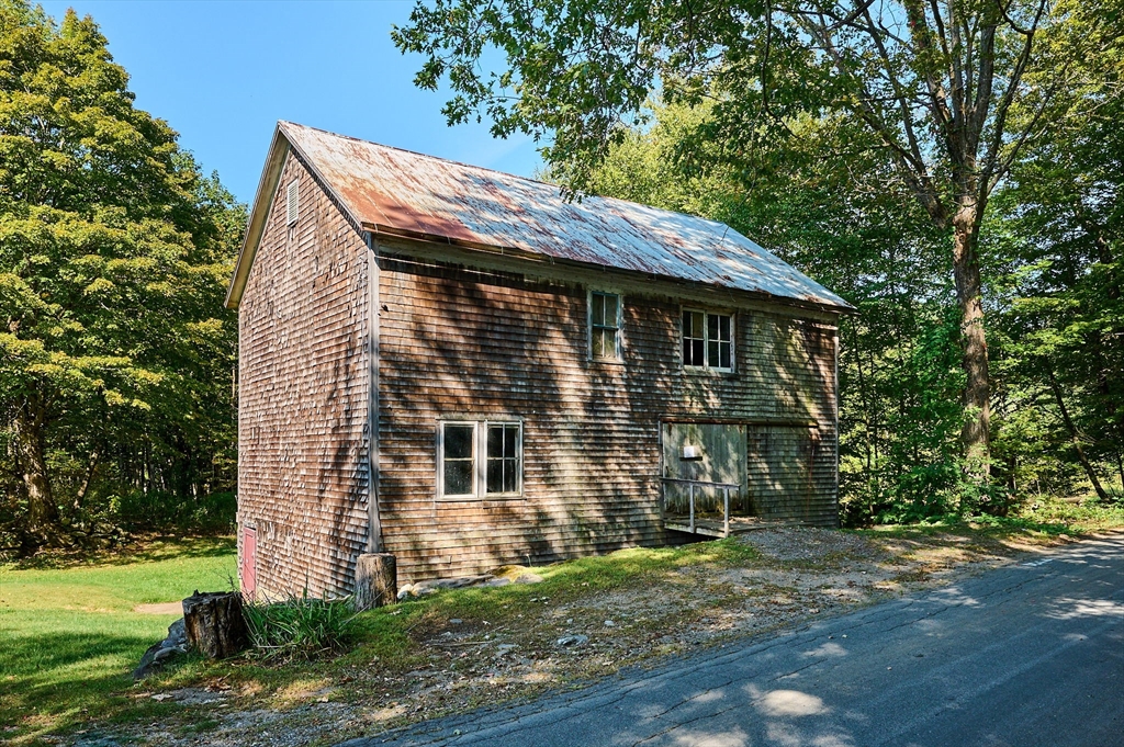 81 Smith Road Ashfield, MA 01330 - Photo 39 of 41 a view of a house with a yard
