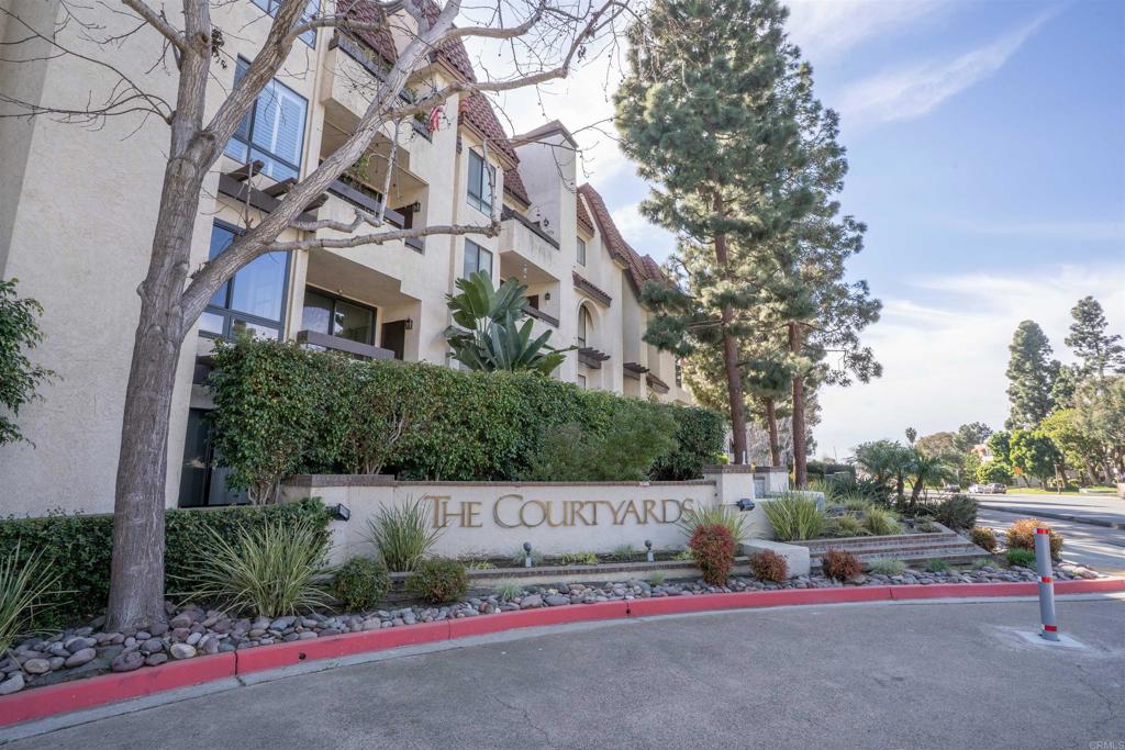 5845 Friars Road, Unit 1316 San Diego, CA 92110 - Photo 2 of 29 a front view of a house with garden