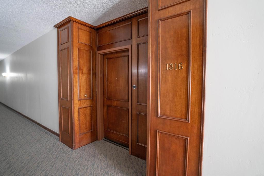 5845 Friars Road, Unit 1316 San Diego, CA 92110 - Photo 4 of 29 a view of elevator with hallway