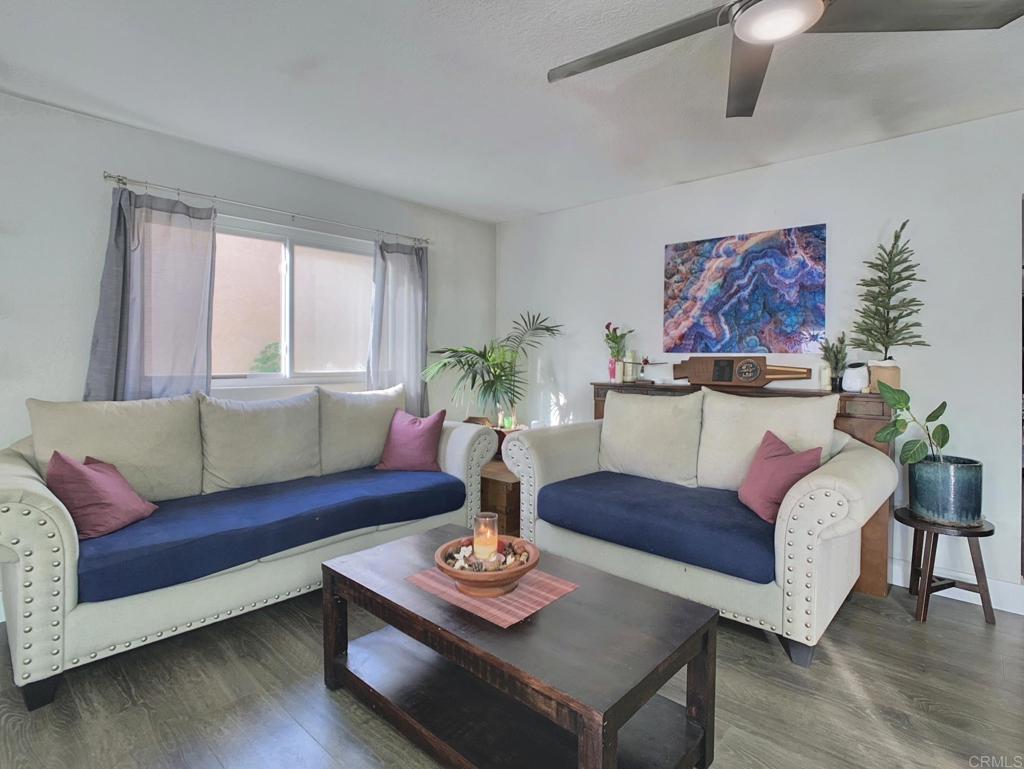 13758 Pomerado Road Poway, CA 92064 - Photo 13 of 32 a living room with furniture and a large window