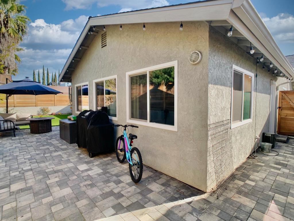 13758 Pomerado Road Poway, CA 92064 - Photo 31 of 32 a view of a house with backyard and sitting area