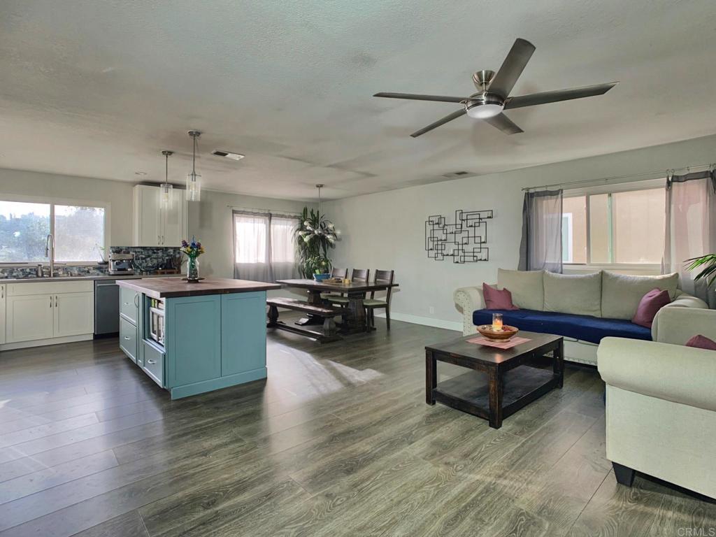 13758 Pomerado Road Poway, CA 92064 - Photo 5 of 32 a living room with furniture and kitchen view