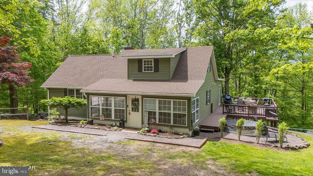 2025 Whiskey Run Road Muncy Valley, PA 17758 - Photo 1 of 54 Charming home nestled in lush greenery.