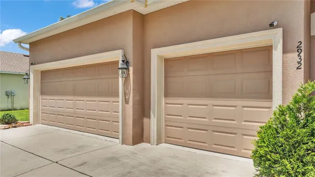 aerial view of a house with a yard