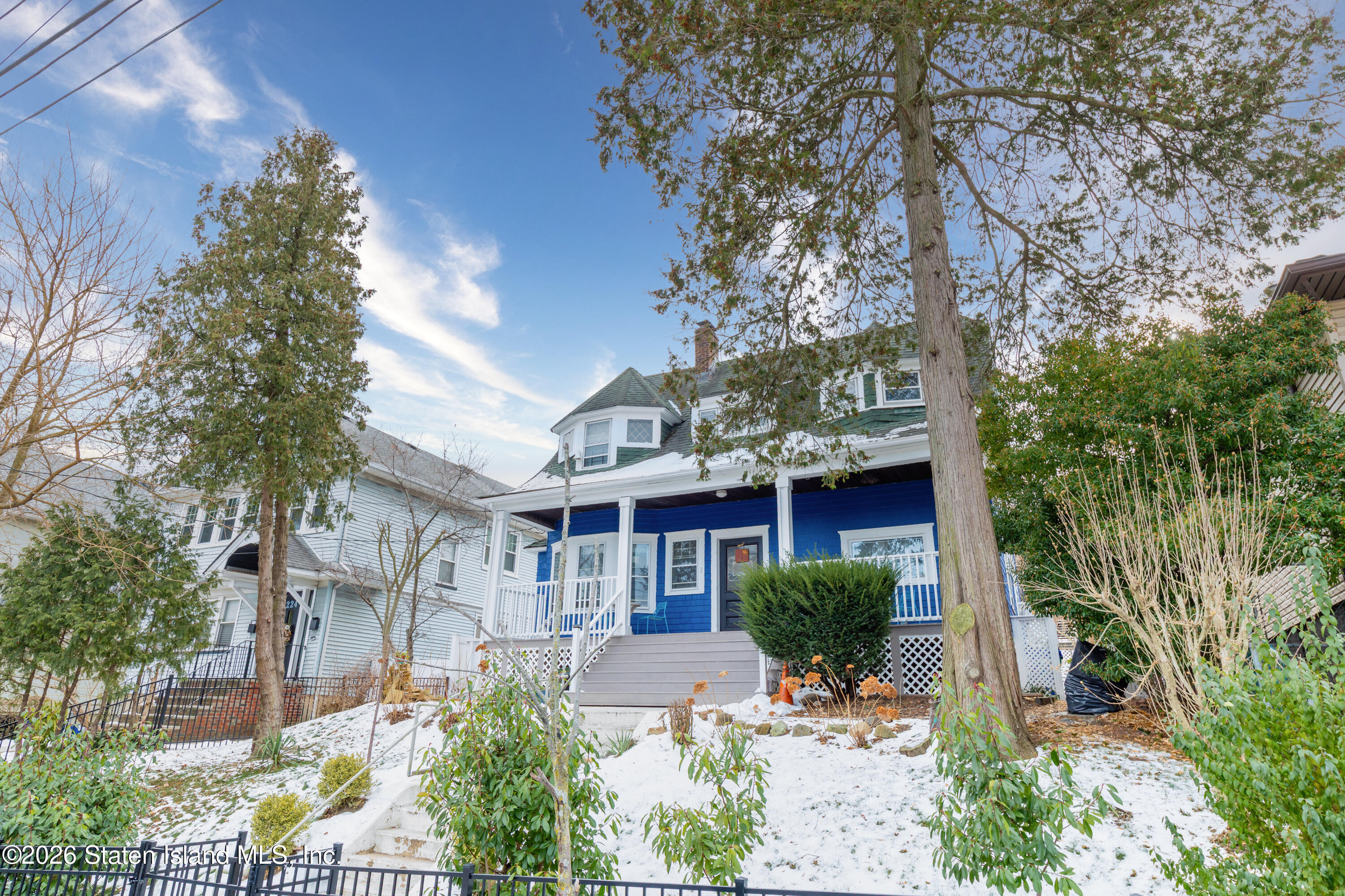 226 Castleton Avenue Staten Island, NY 10301 - Photo 1 of 32 a front view of a house with garden