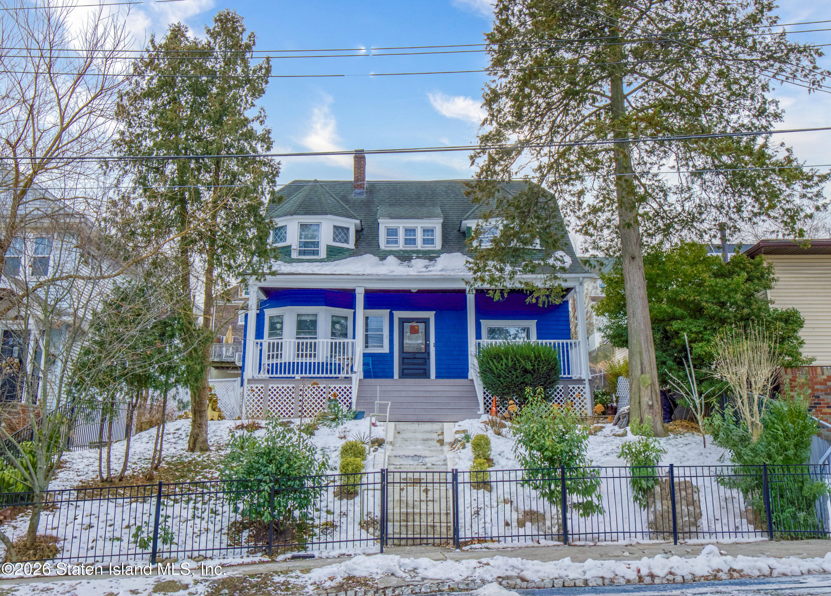 226 Castleton Avenue Staten Island, NY 10301 - Photo 2 of 32 a front view of a house with garden