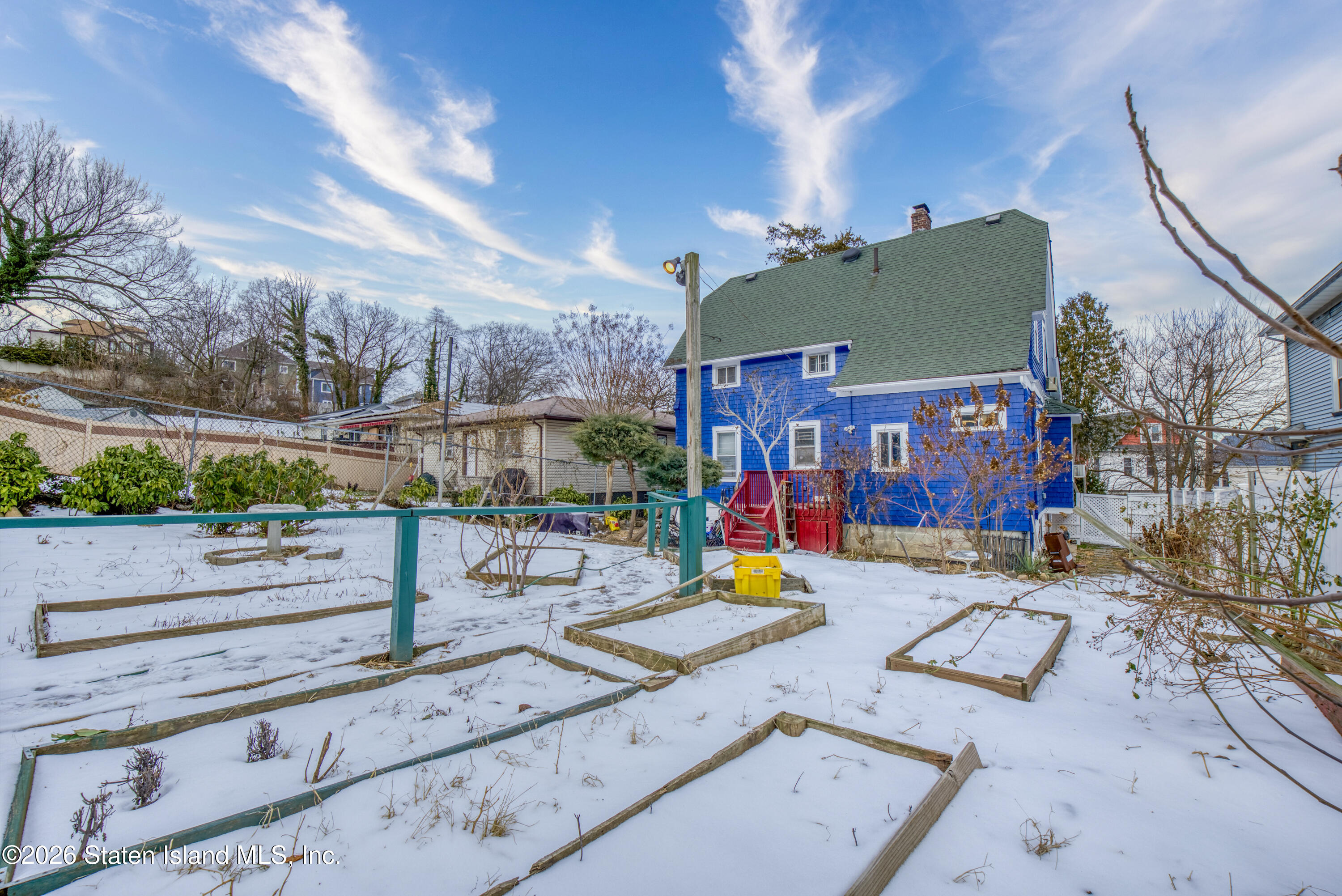 226 Castleton Avenue Staten Island, NY 10301 - Photo 29 of 32 a view of a swimming pool with a patio