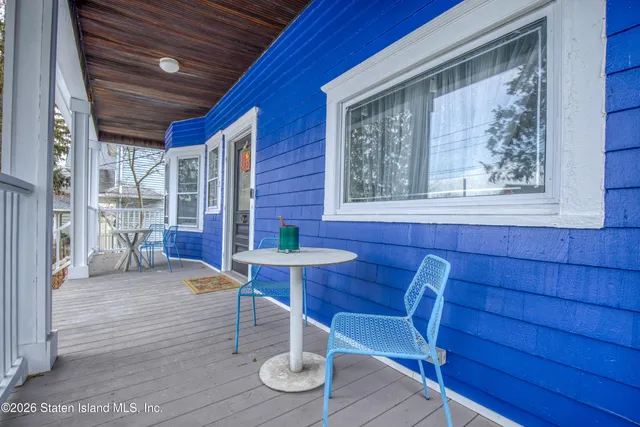 a view of a livingroom with furniture and window