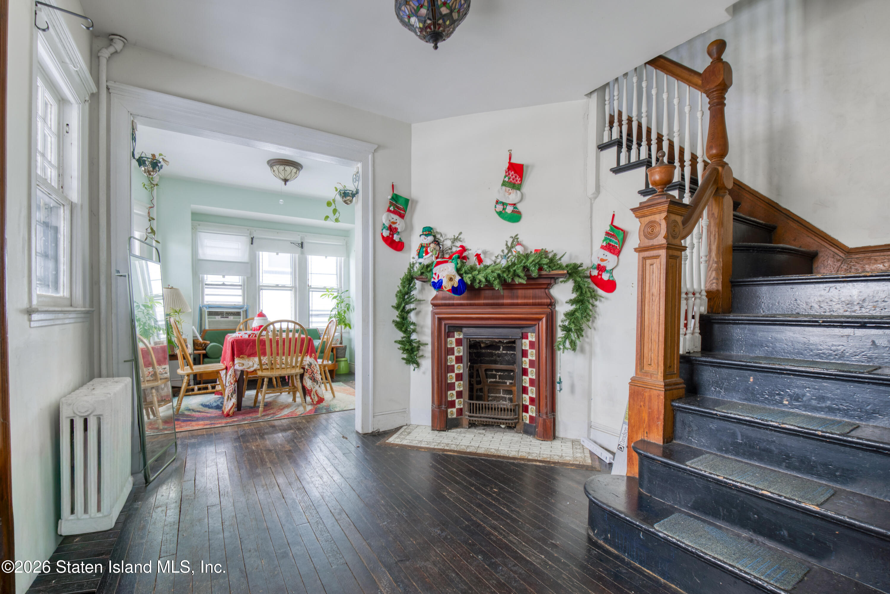 226 Castleton Avenue Staten Island, NY 10301 - Photo 5 of 32 a view of entryway livingroom and hall with wooden floor