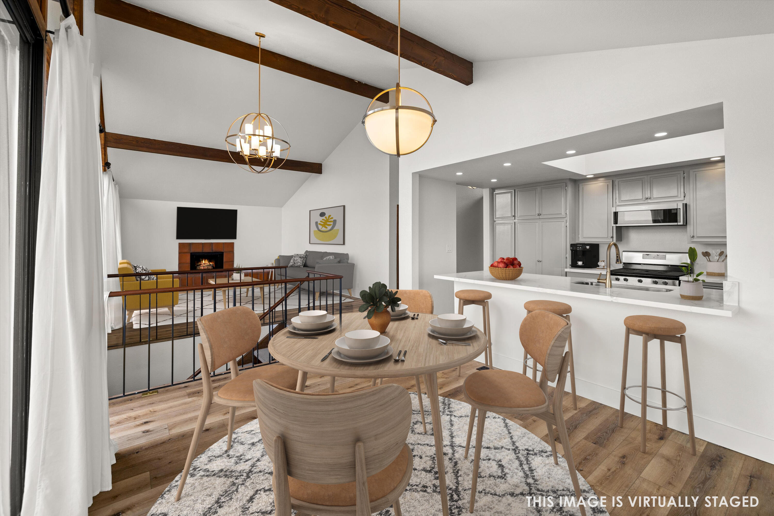 34 Rubio Road Santa Barbara, CA 93103 - Photo 13 of 36 a large kitchen with a table and chairs