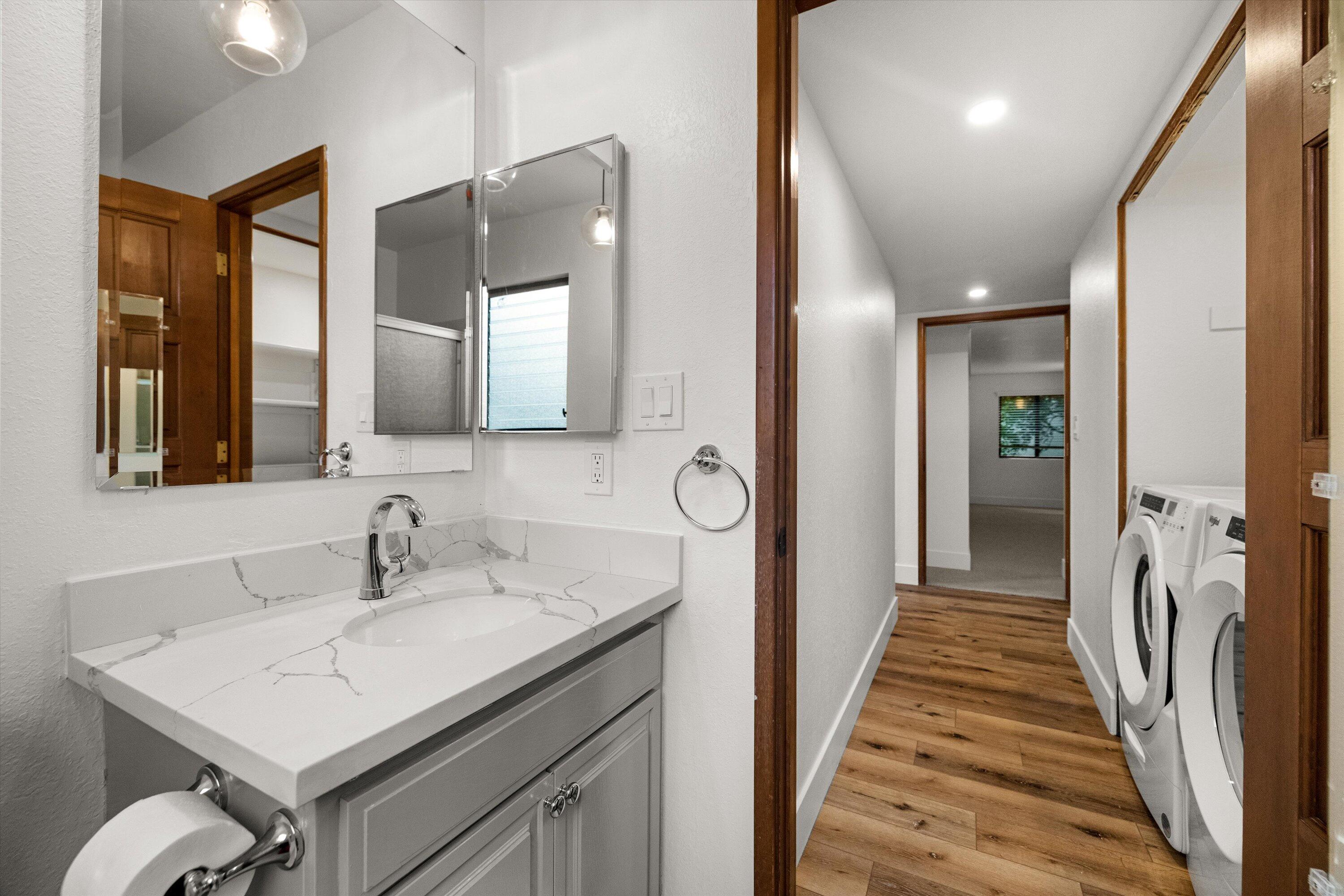 34 Rubio Road Santa Barbara, CA 93103 - Photo 24 of 36 a en suite bathroom with a sink and mirror
