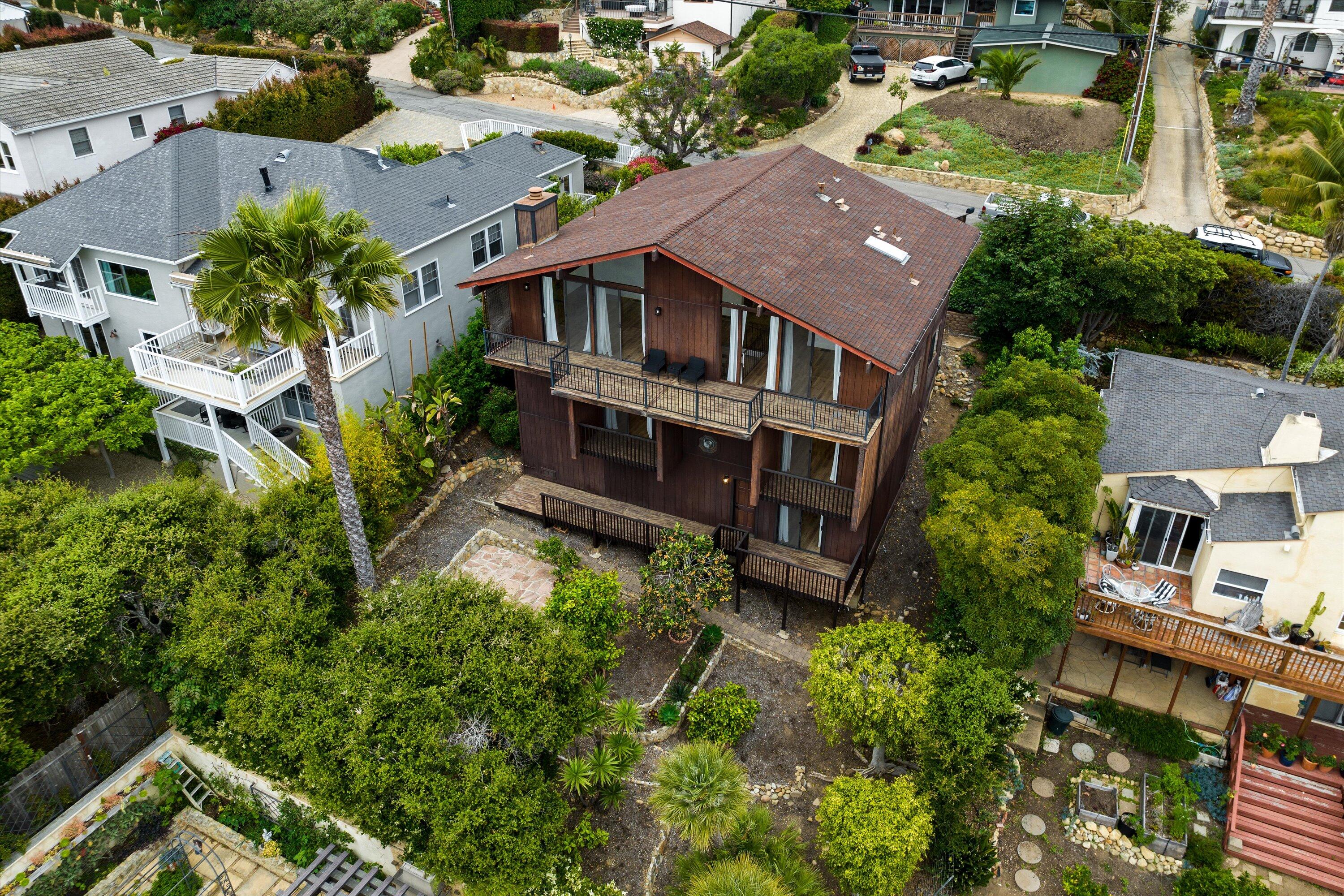 34 Rubio Road Santa Barbara, CA 93103 - Photo 28 of 36 an aerial view of multiple houses with a yard