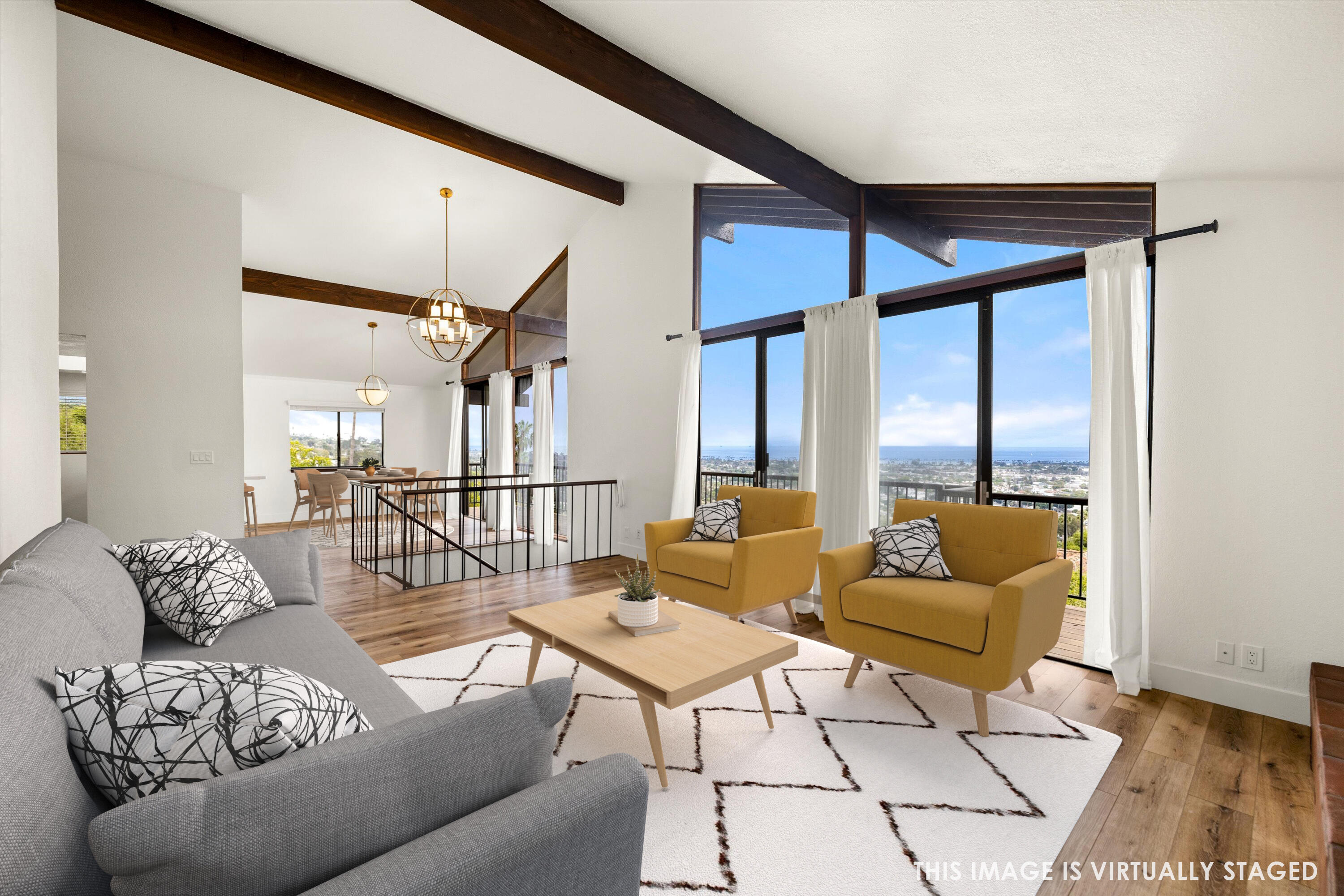 34 Rubio Road Santa Barbara, CA 93103 - Photo 7 of 36 a living room with furniture and a table