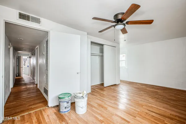 a view of an entryway of wooden floor