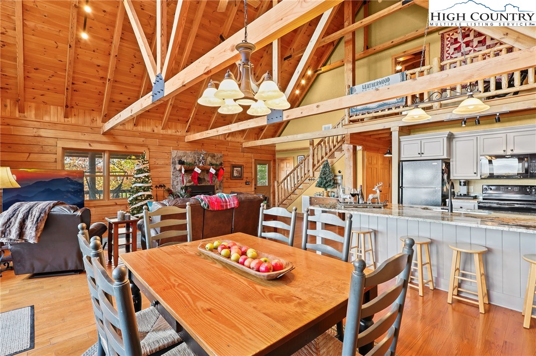 305 Fox Cove Road Ferguson, NC 28624 - Photo 11 of 50 a outdoor dining area with furniture and a kitchen view