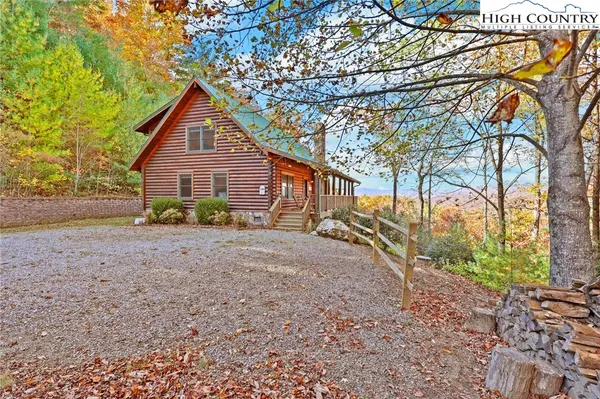 a view of a house with tub and trees around