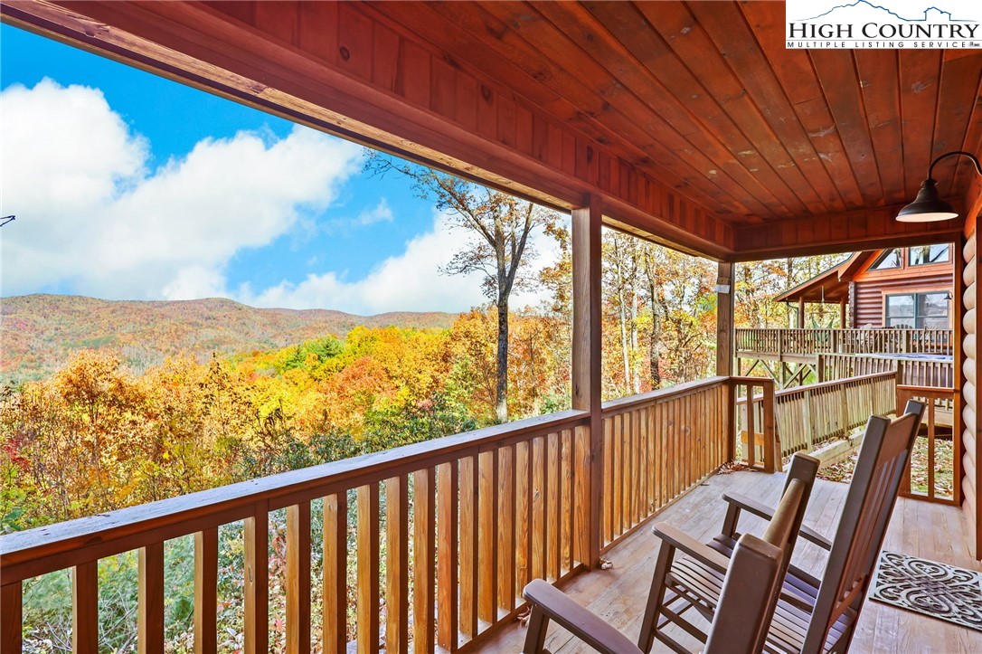305 Fox Cove Road Ferguson, NC 28624 - Photo 42 of 50 a view of a two chair in the balcony