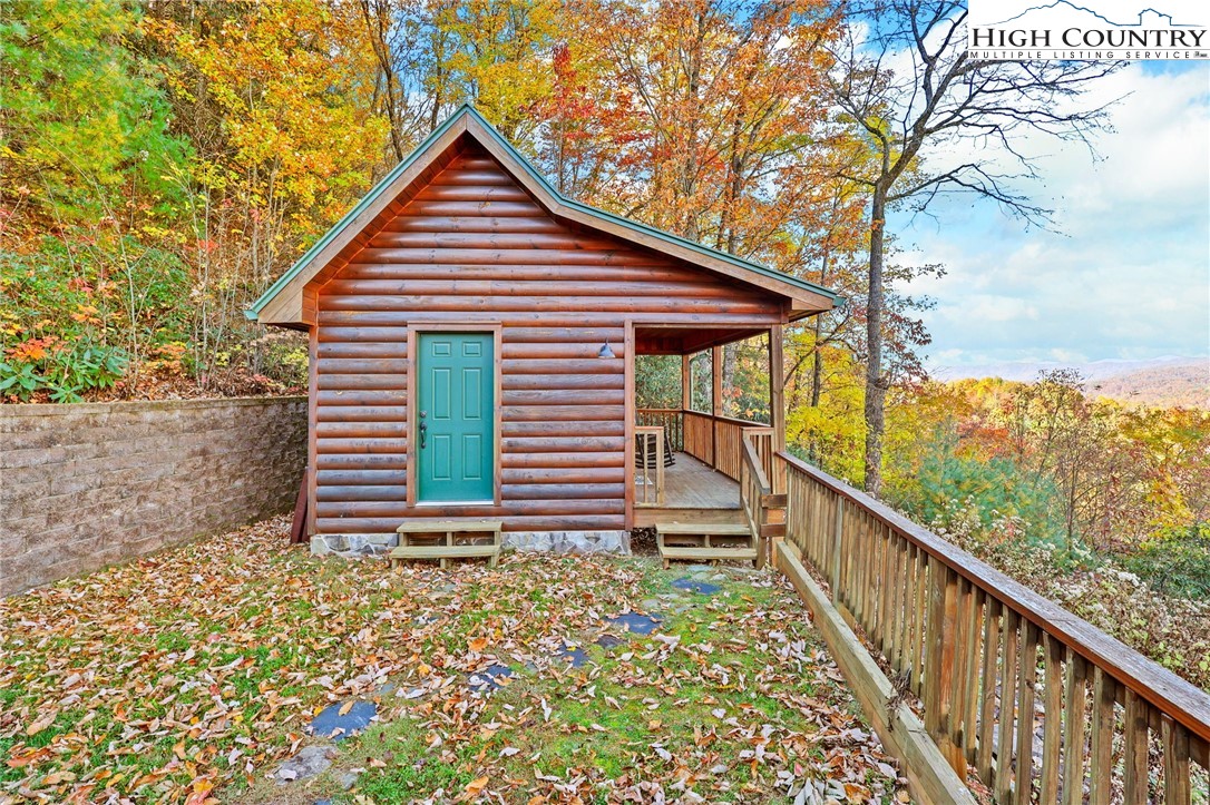 305 Fox Cove Road Ferguson, NC 28624 - Photo 43 of 50 a view of a house with wooden fence