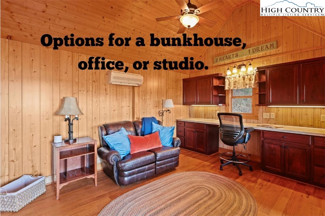 305 Fox Cove Road Ferguson, NC 28624 - Photo 45 of 50 a bedroom with furniture and a bed