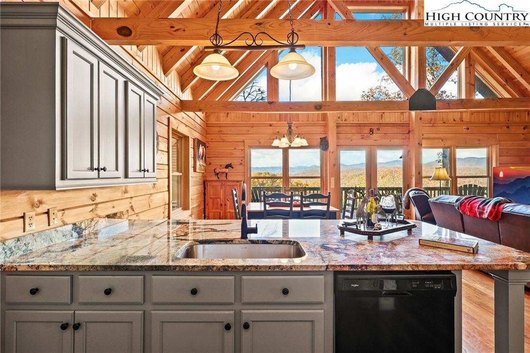 305 Fox Cove Road Ferguson, NC 28624 - Photo 7 of 50 a kitchen with a sink and a large window