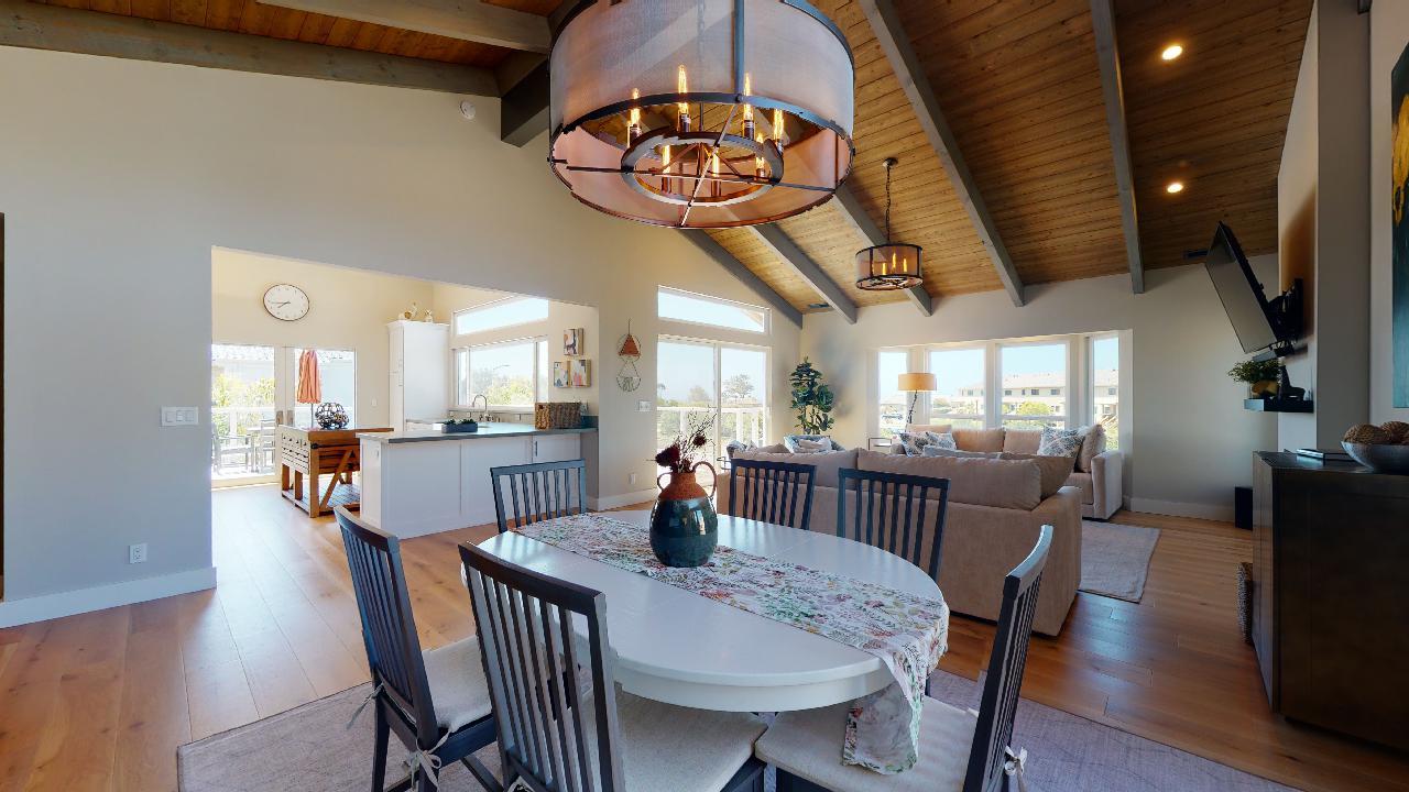150 Vía Soderini Aptos, CA 95003 - Photo 16 of 73 a view of a dining room with furniture window and wooden floor