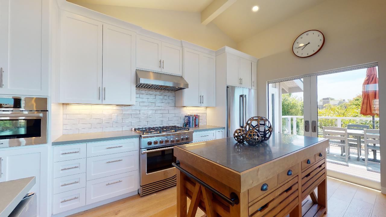 150 Vía Soderini Aptos, CA 95003 - Photo 22 of 73 a kitchen with a stove cabinets and window