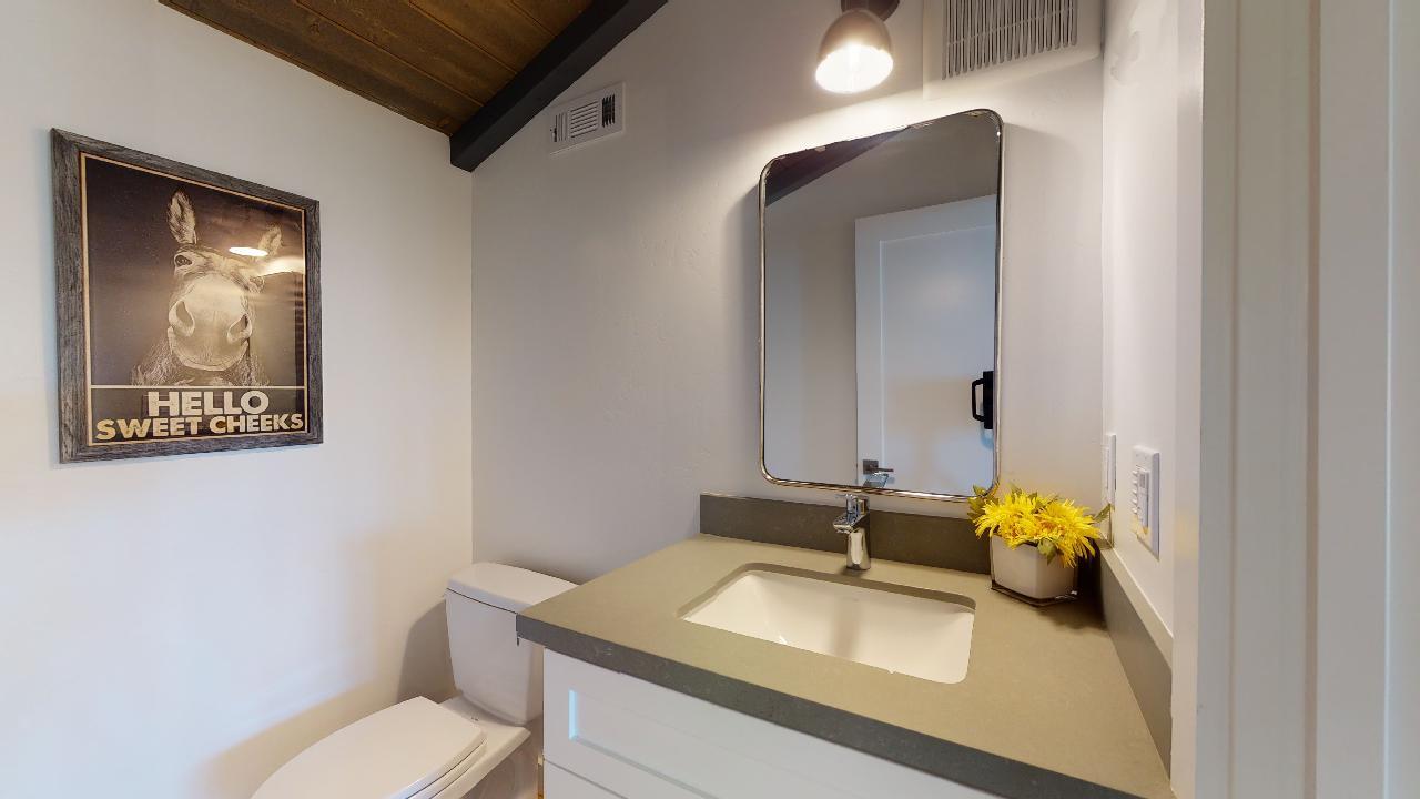 150 Vía Soderini Aptos, CA 95003 - Photo 24 of 73 a bathroom with a sink toilet and mirror